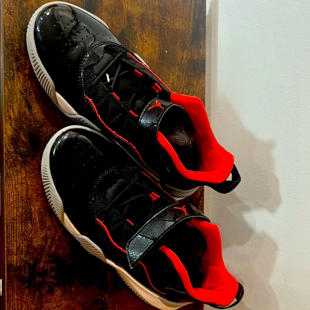 Jordan Black and Red Sneakers Athletic Design